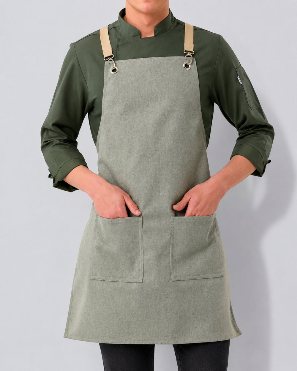 Staff member wearing a branded apron at IF Brand Works